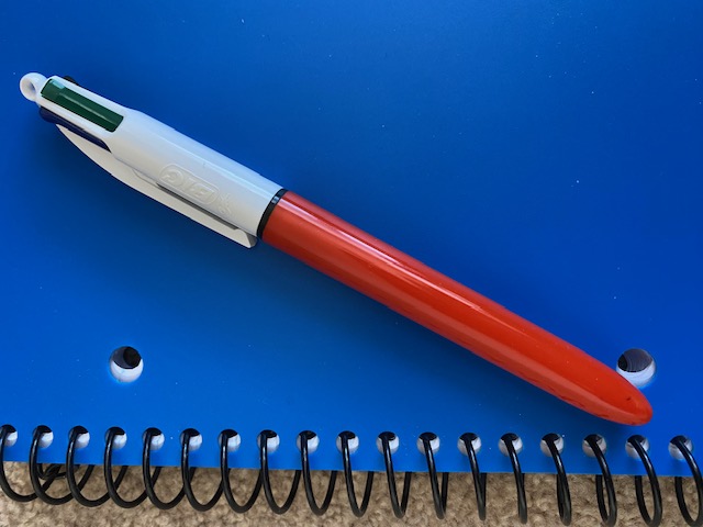 photo of a pen and notebook